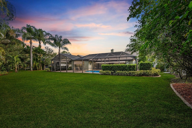 yard at dusk with a lanai