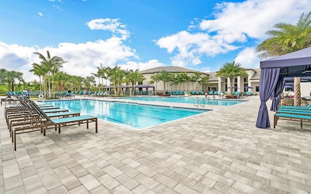 view of pool featuring a gazebo and a patio