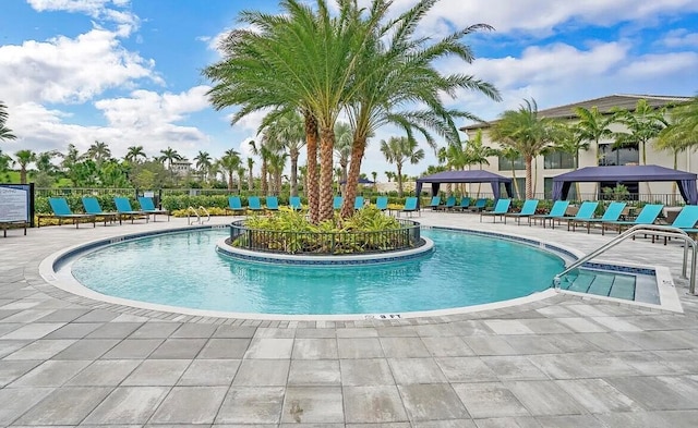 view of pool featuring a gazebo and a patio