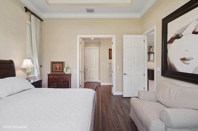 bedroom featuring ornamental molding and dark hardwood / wood-style floors