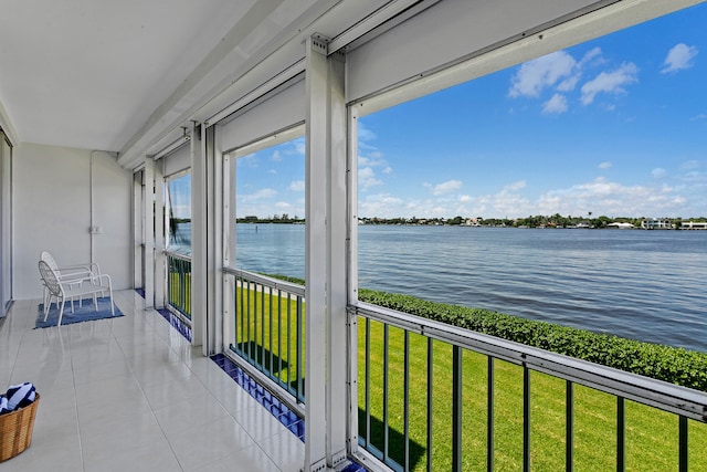 balcony featuring a water view