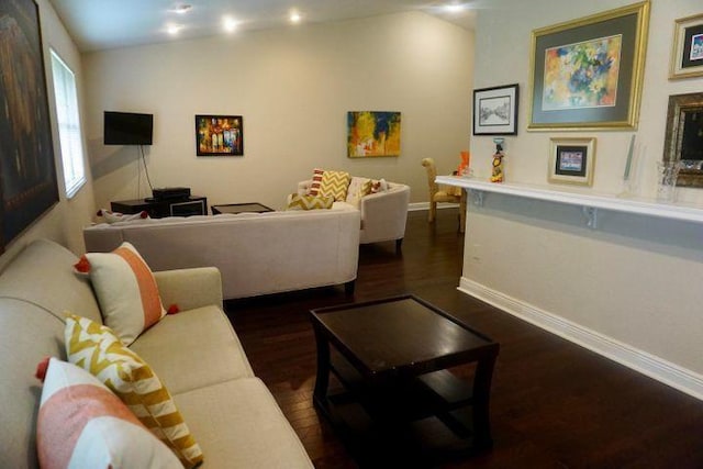 living room with dark hardwood / wood-style floors