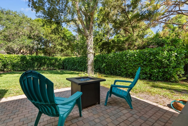 view of patio / terrace with a fire pit