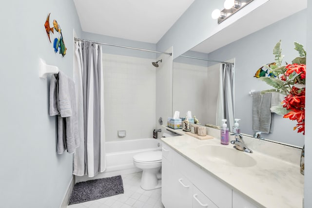 full bathroom featuring vanity, shower / bath combo with shower curtain, toilet, and tile patterned floors