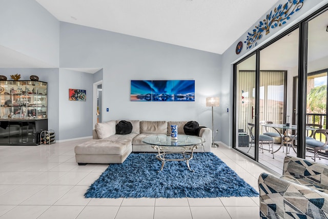 tiled living room with high vaulted ceiling