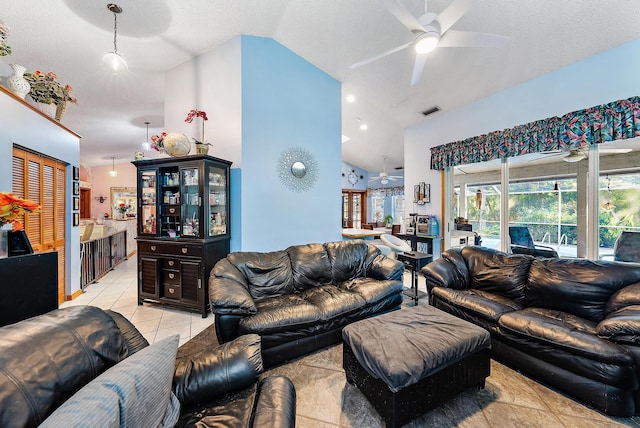 living room featuring light tile patterned flooring, a textured ceiling, high vaulted ceiling, and ceiling fan