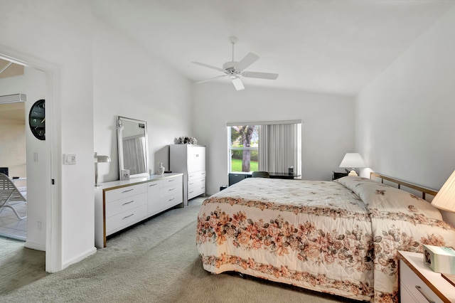 carpeted bedroom with vaulted ceiling and ceiling fan