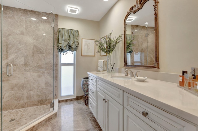 bathroom featuring vanity, tile patterned flooring, and an enclosed shower