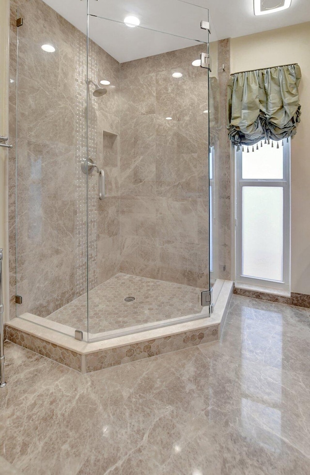 bathroom featuring walk in shower