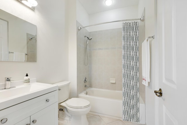 full bathroom featuring shower / bath combo, vanity, toilet, and tile patterned floors