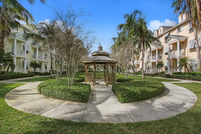 view of community featuring a yard and a gazebo