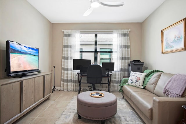 tiled living room featuring ceiling fan