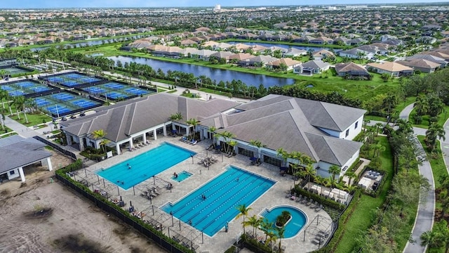 bird's eye view with a water view