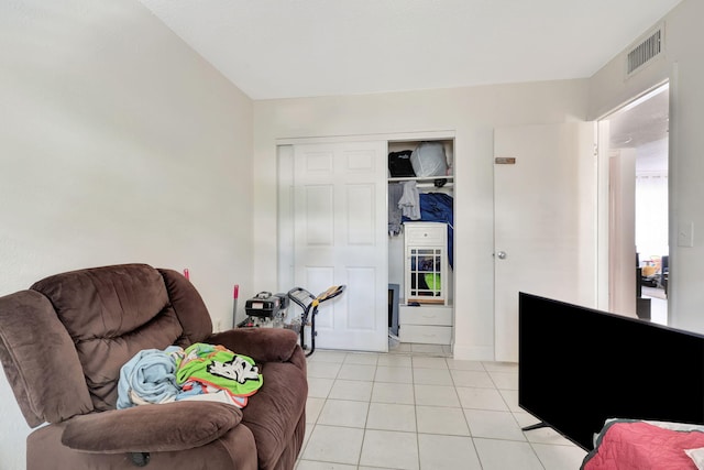 living room with light tile patterned flooring