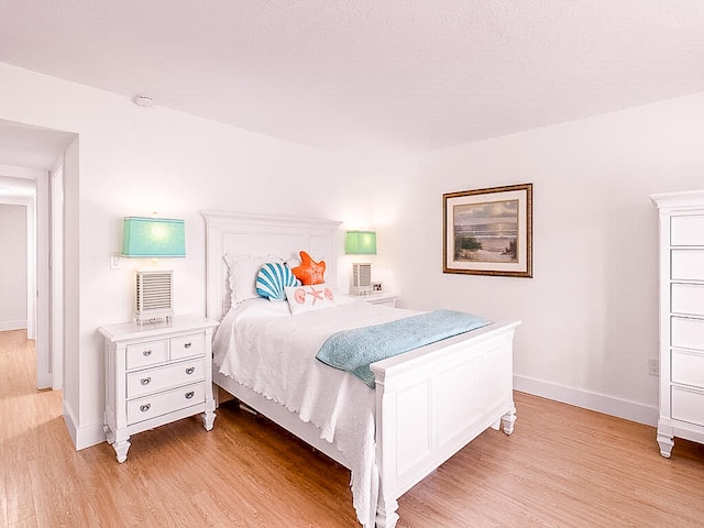 bedroom featuring light hardwood / wood-style floors