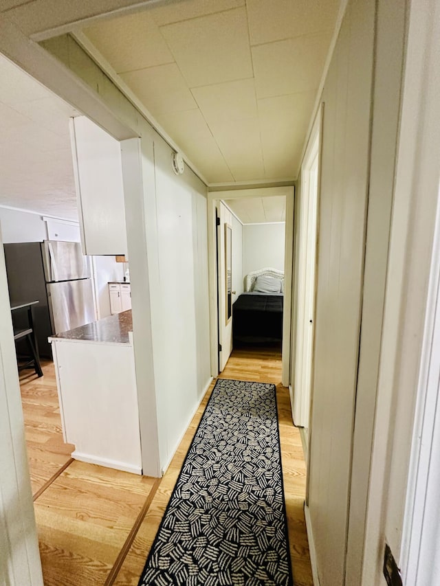 hallway with light wood-style flooring