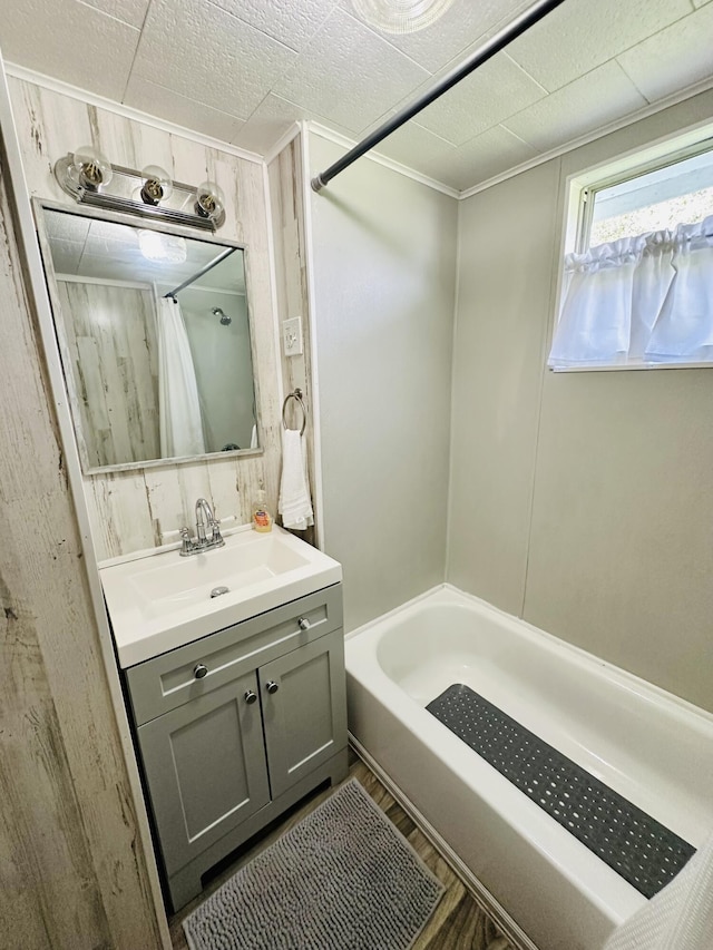 full bathroom with vanity and shower / bath combo with shower curtain