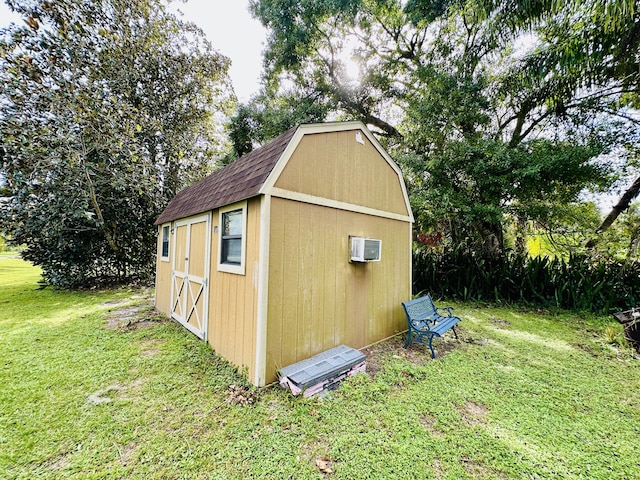 view of shed featuring an AC wall unit