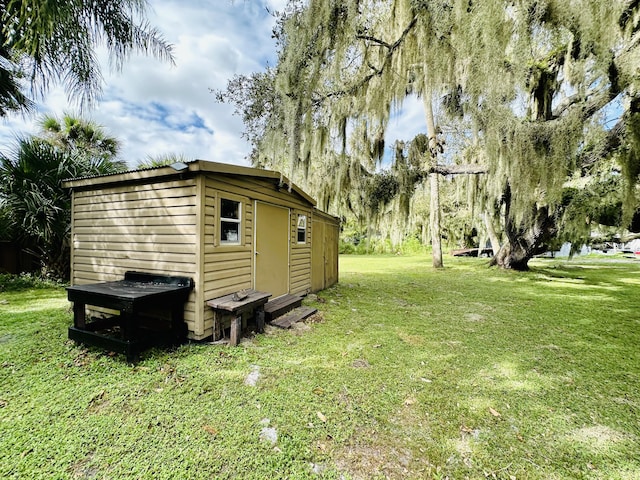 view of outbuilding with an outdoor structure