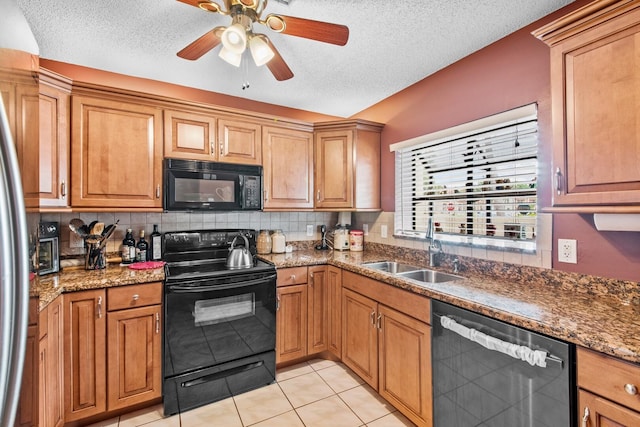 kitchen with ceiling fan, sink, tasteful backsplash, a textured ceiling, and black appliances