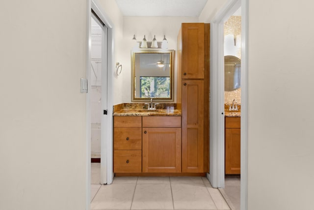 bathroom with vanity and tile patterned floors