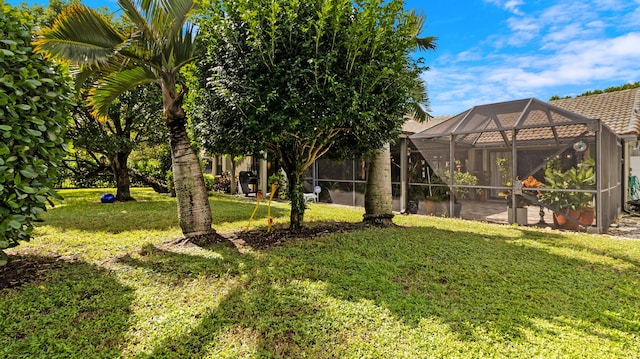 view of yard featuring a lanai