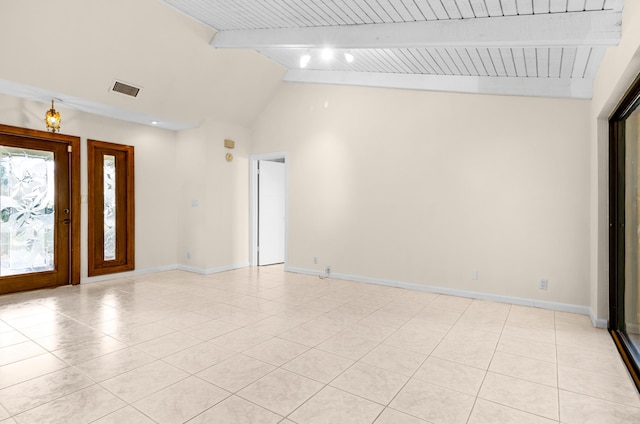 tiled empty room with high vaulted ceiling, wood ceiling, and beam ceiling