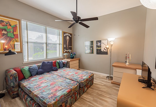 bedroom featuring light hardwood / wood-style floors and ceiling fan