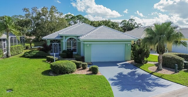 view of front facade featuring a garage and a front yard