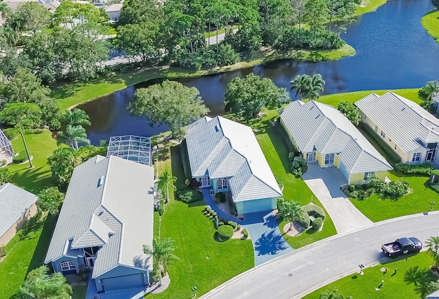 drone / aerial view with a water view