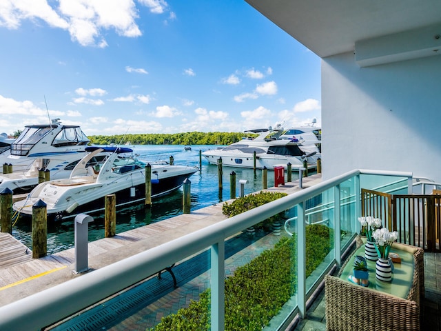 balcony featuring a water view