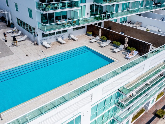 view of swimming pool with a patio