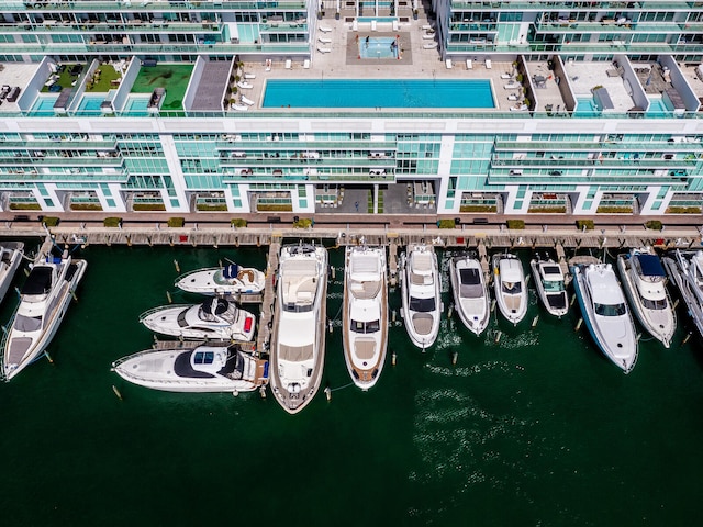 birds eye view of property featuring a water view