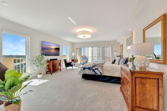 bedroom with light colored carpet