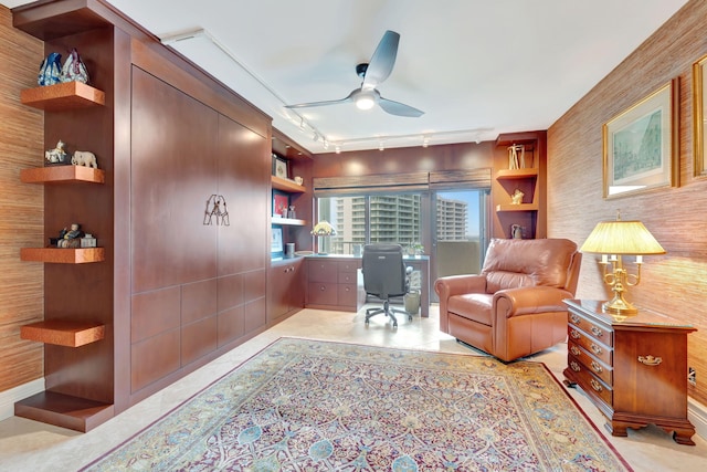 office featuring rail lighting and ceiling fan