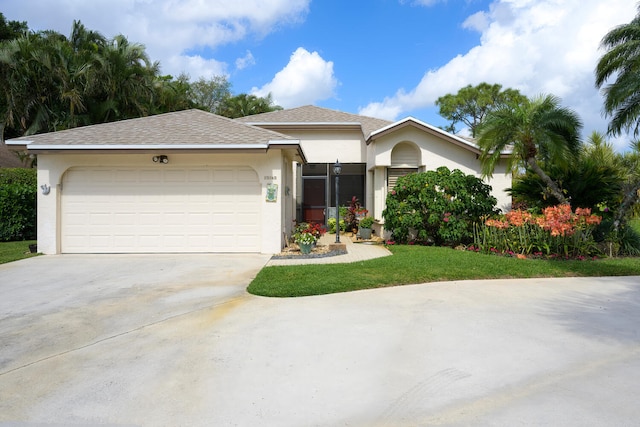 view of front of property with a garage