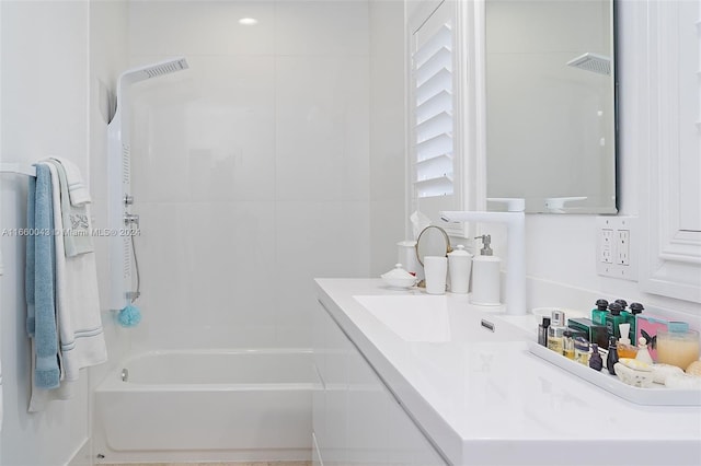 bathroom featuring vanity and tub / shower combination