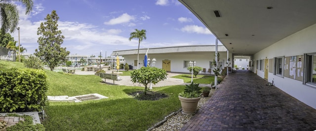 3040 Lake Osborne Dr Unit 106, Lake Worth Beach, FL 33461 - view of home's community featuring a yard