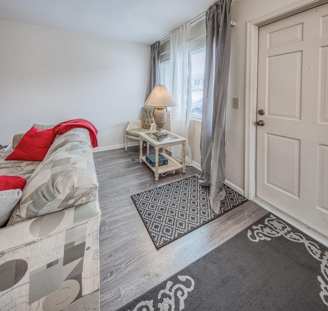 3040 Lake Osborne Dr Unit 106, Lake Worth Beach, FL 33461 - entryway with wood finished floors and baseboards