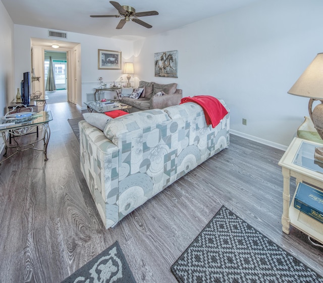 3040 Lake Osborne Dr Unit 106, Lake Worth Beach, FL 33461 - living area featuring wood finished floors, ceiling fan, and baseboards