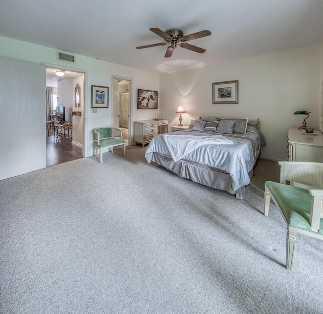 3040 Lake Osborne Dr Unit 106, Lake Worth Beach, FL 33461 - carpeted bedroom with a ceiling fan and baseboards