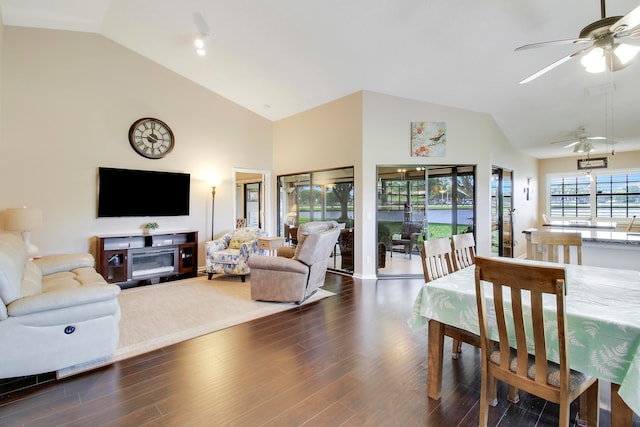 living room featuring high vaulted ceiling, dark hardwood / wood-style flooring, and ceiling fan