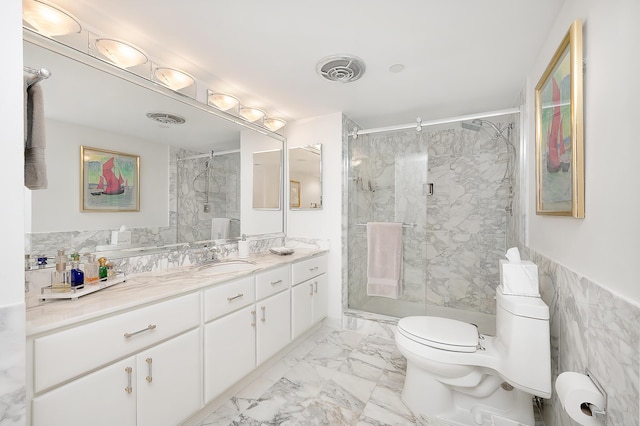 4001 N Ocean Blvd Ph 3, Boca Raton, FL 33431 - bathroom featuring toilet, marble finish flooring, vanity, a marble finish shower, and tile walls