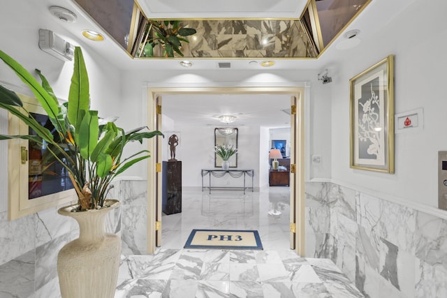4001 N Ocean Blvd Ph 3, Boca Raton, FL 33431 - corridor with wainscoting and tile walls