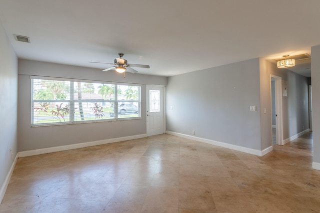 spare room with ceiling fan