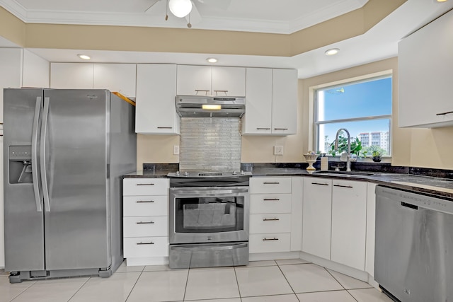 kitchen featuring stainless steel appliances, crown molding, sink, light tile patterned floors, and white cabinets