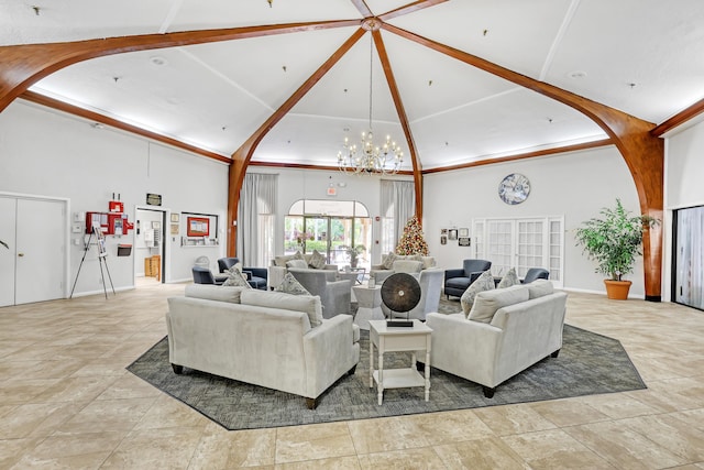 living room with a chandelier and a high ceiling