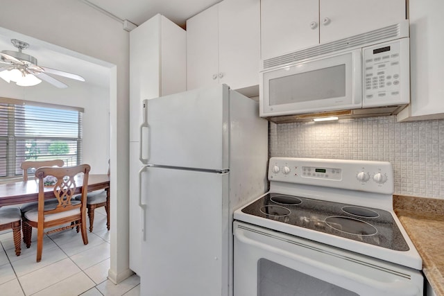 kitchen featuring white cabinets, tasteful backsplash, light tile patterned floors, ceiling fan, and white appliances