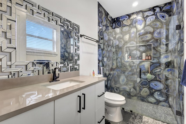 166 Neva Dr, West Palm Beach, FL 33415 - full bathroom featuring vanity, toilet, and tiled shower