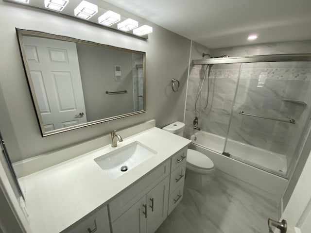 15324 Lakes Of Delray Blvd Unit 104, Delray Beach, FL 33484 - full bathroom featuring toilet, vanity, bath / shower combo with glass door, and marble look tiles